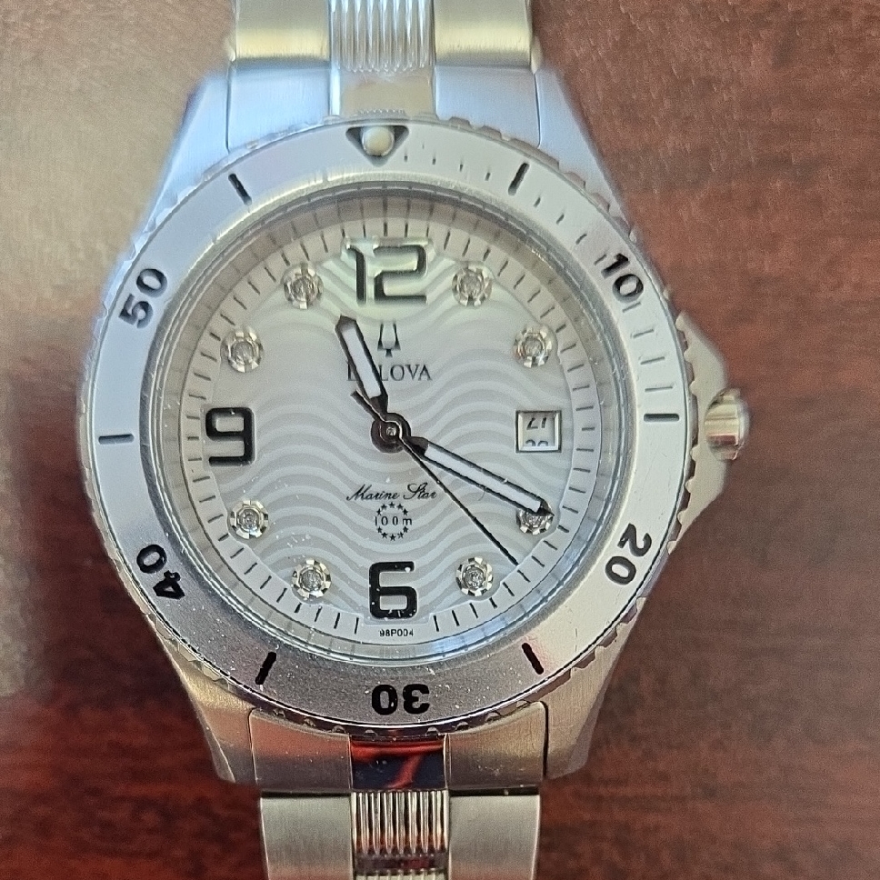Bulova Marine Star Silver Watch With White Dial And Crystal Markers